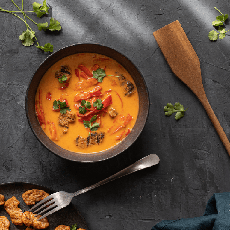 Nuggets with roasted sweet potato and a meal salad with peanut dressing